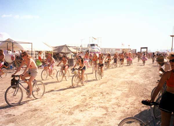 Photo of Topless Bicycle Race, Cont’d